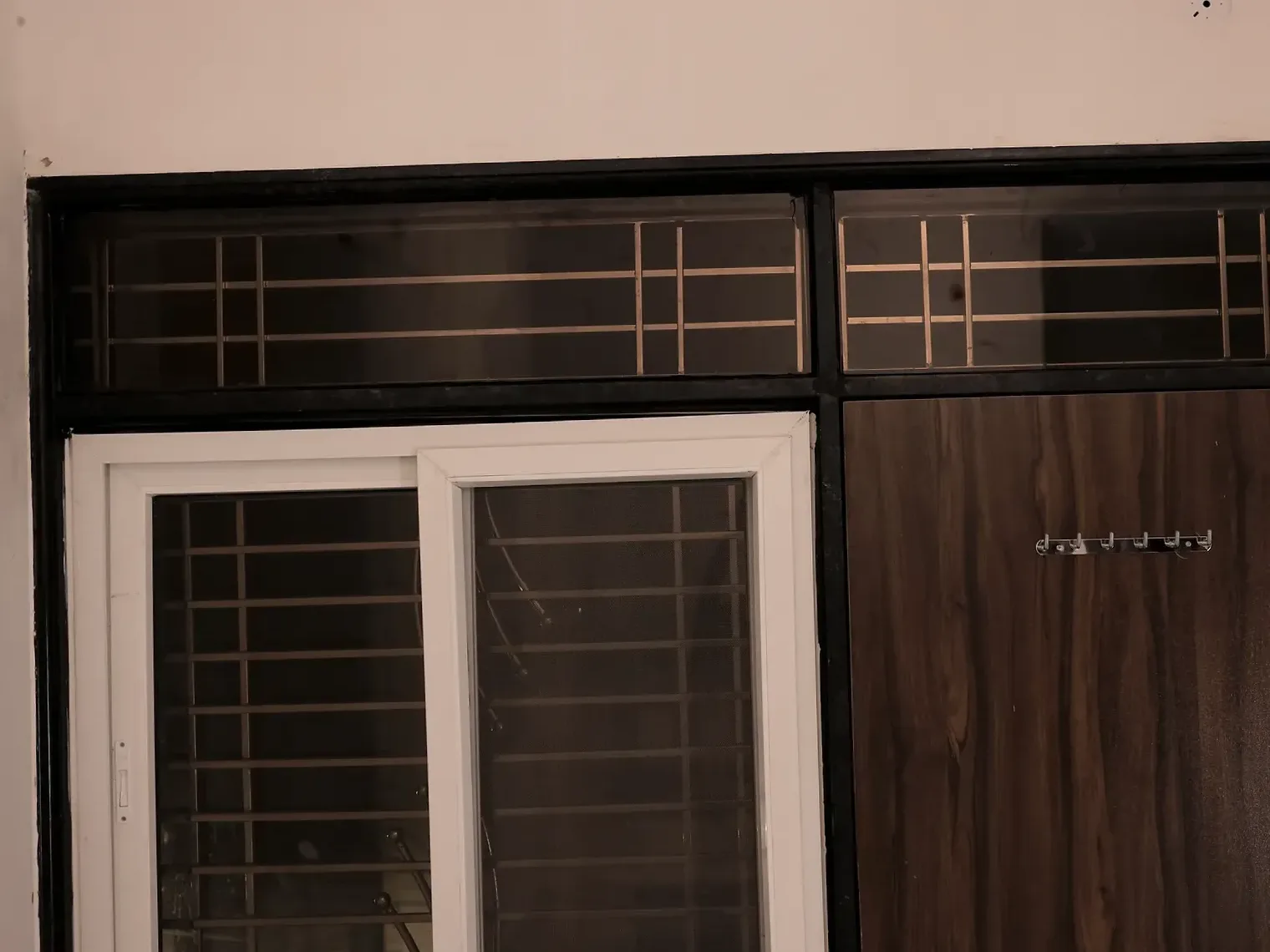 Window and door frames on one wall