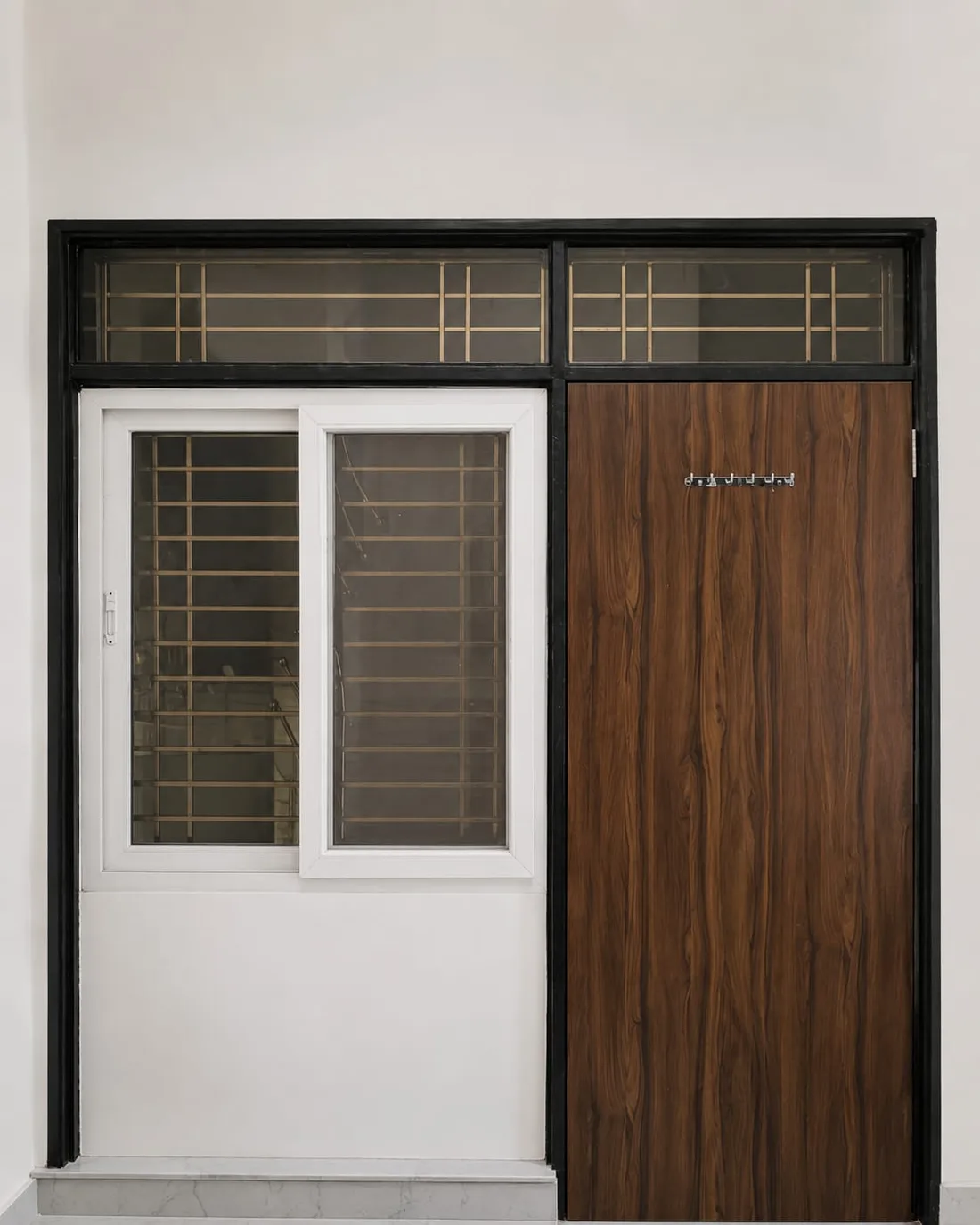 Door, window and vent in one continuous black frame